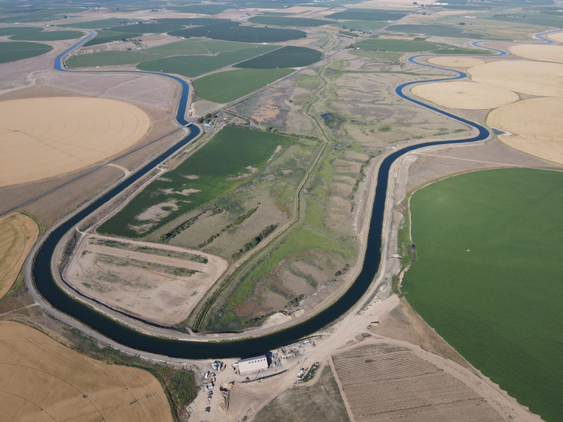 overhead shot of a canal that runs through East District farmland